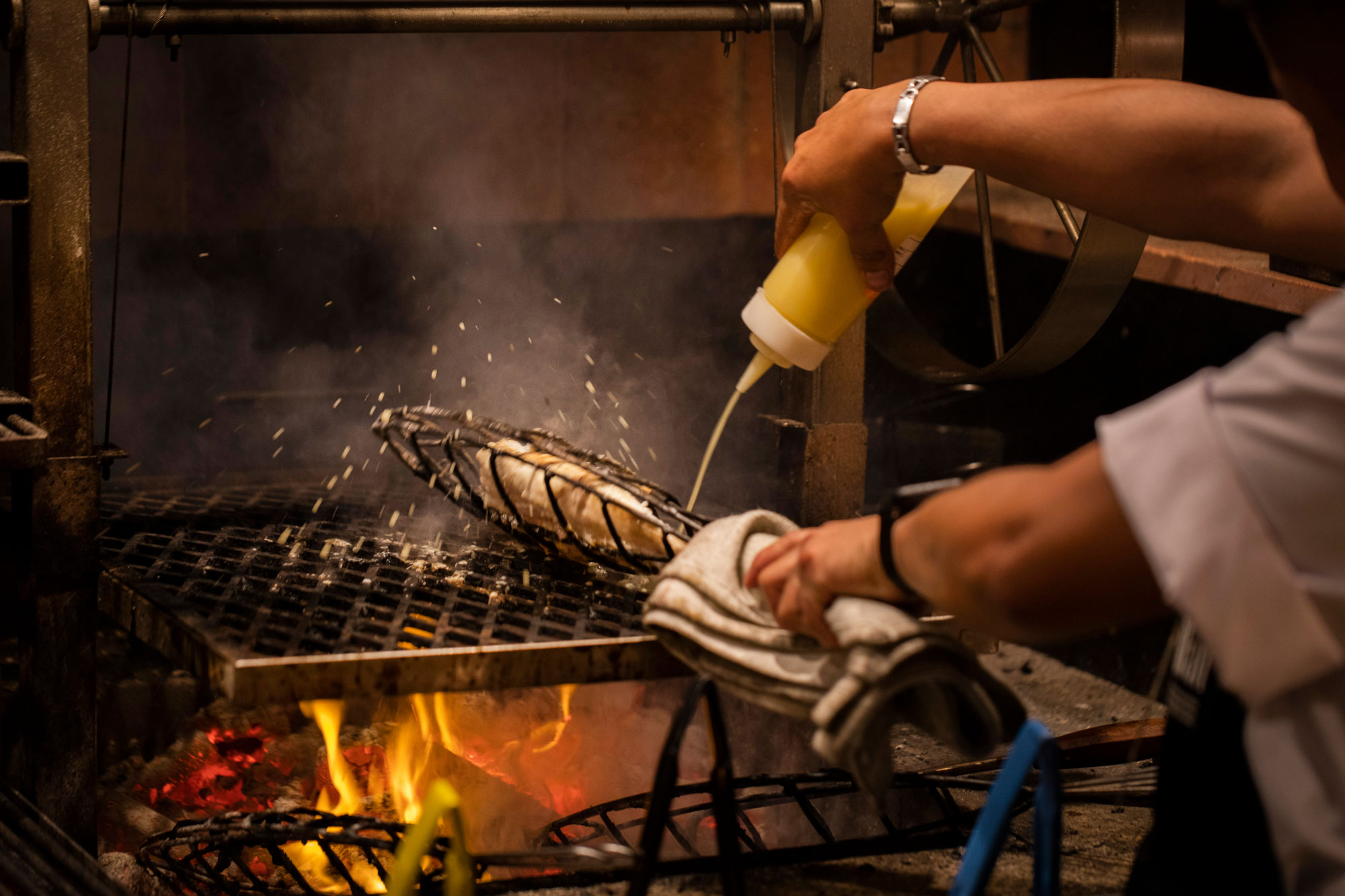 Chef grilling fish